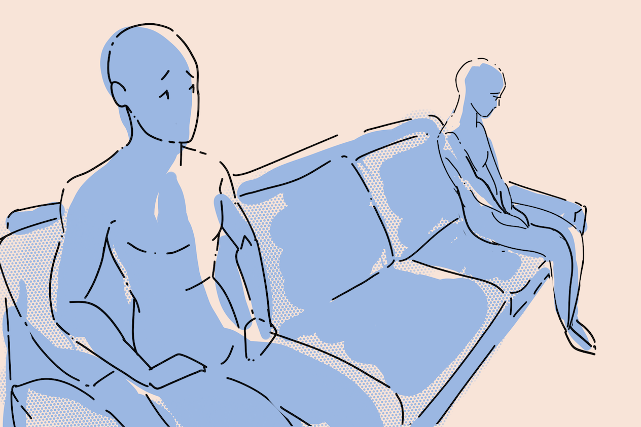 Couple sitting on couch being board